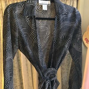 Black and cream dotted wrap blouse. Great for work